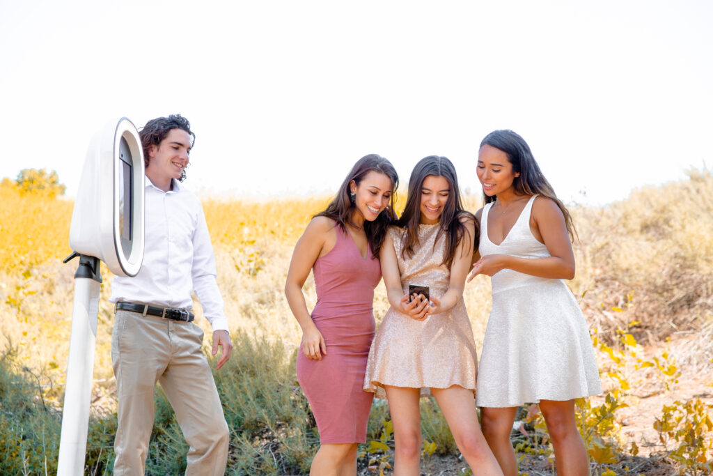 photo booth, outdoors, friends